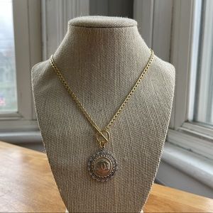 Upcycled Chanel button used to create a new necklace